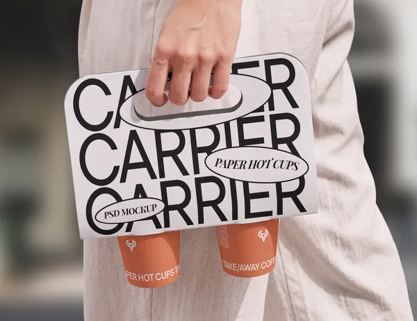 Hand Holding Takeaway Coffee Carrier PSD Mockup
