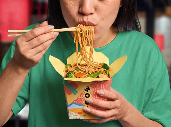 Wok-Style Asian Takeaway Noodle Box PSD Mockup - Eating Scene